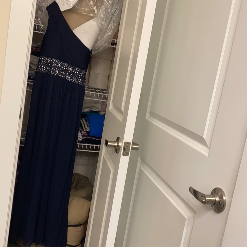Dark blue. Size 6. Hemmed at the bottom